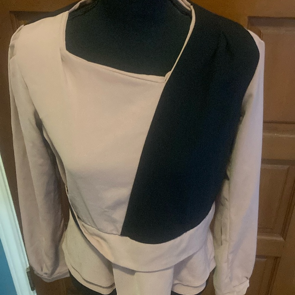 Herb’s size Large. Good pre-owned condition. Pink and black